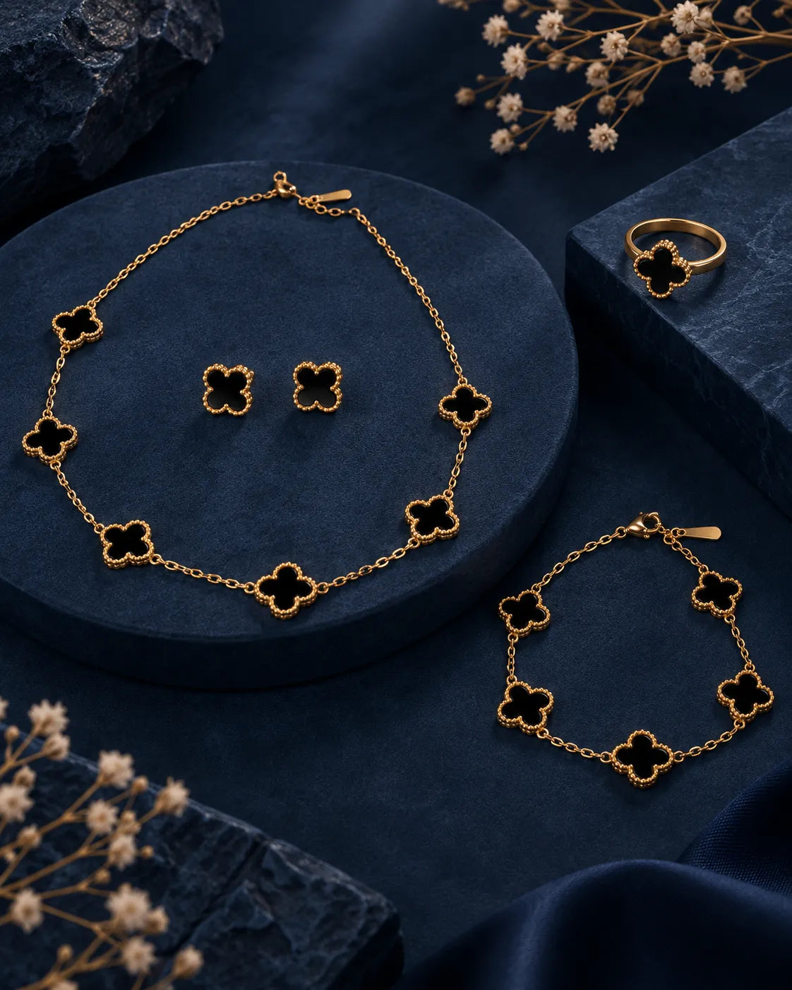Noir Clover Necklace, Bracelet, Ring & Stud Set - close-up detail view
